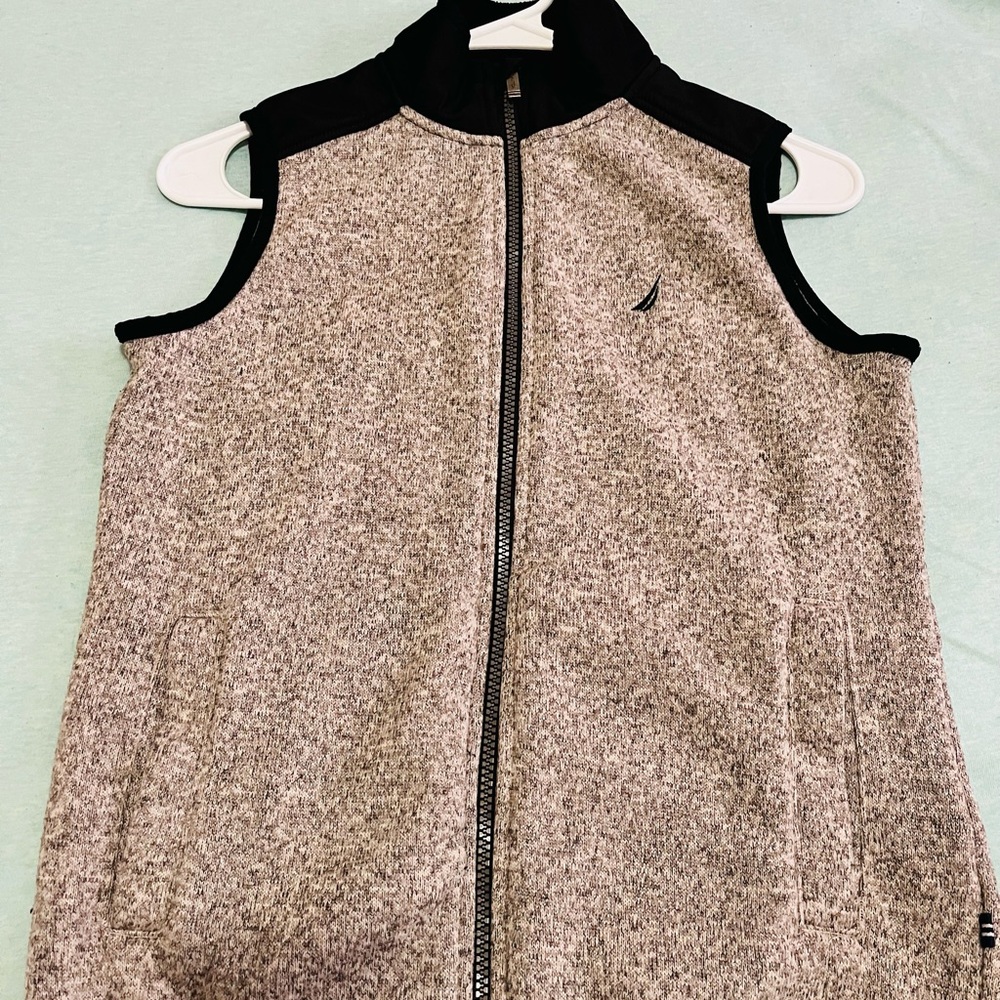 Beautiful Nautica brand vest.Used only a couple of times. It is intact,like new.